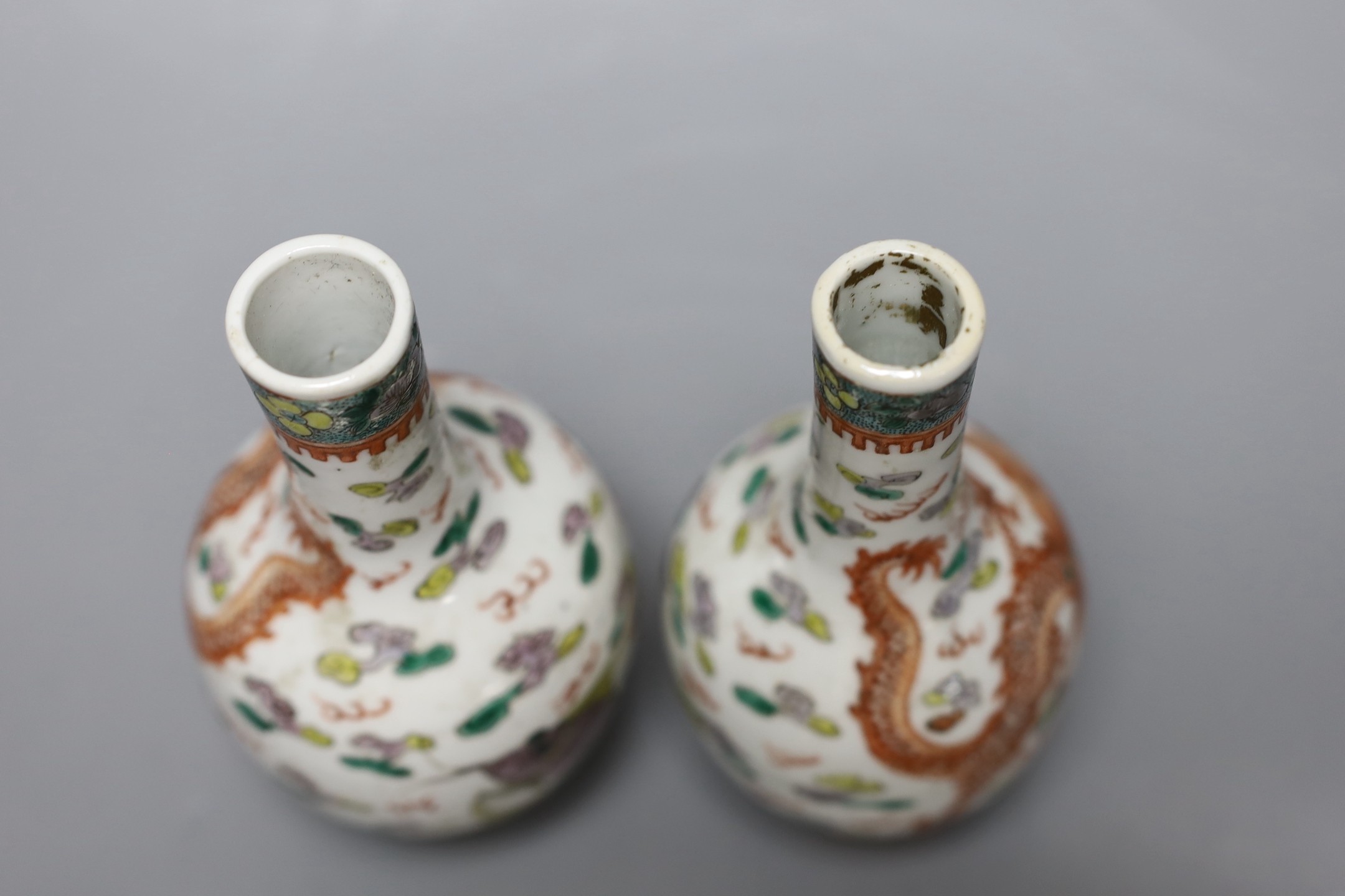 A pair of Chinese enamelled porcelain ‘dragon’ bottle vases, Kangxi marks probably Guangxu period, 15cms high